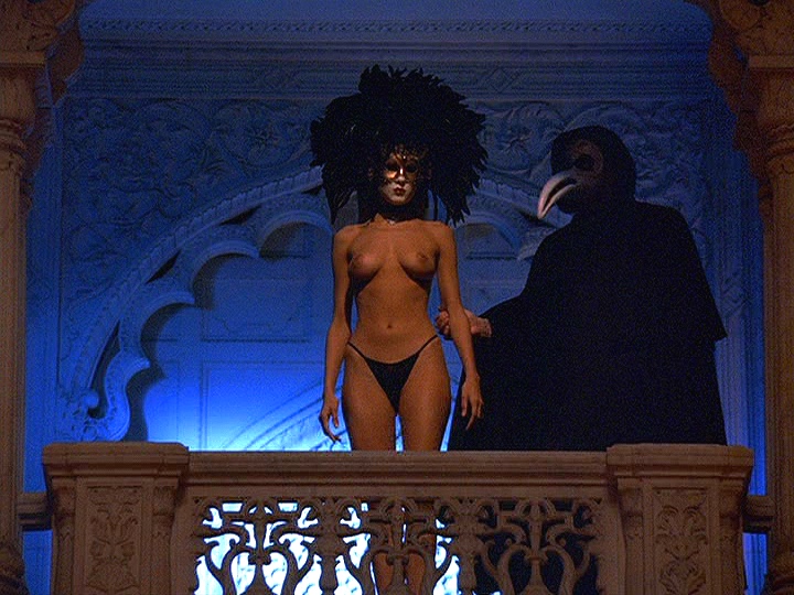 The “Mysterious Woman” &amp; a masked stranger in Stanley Kubrick’s  Eyes Wide Shut  (1999)